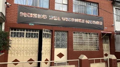 Facade of the Black Friday Museum, a brick building with a large sign at the top that identifies this unique cultural space in Bogotá.