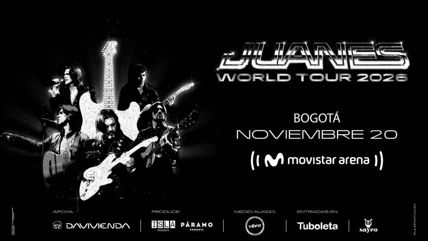 Una imagen en blanco y negro de alto contraste de Juanes tocando la guitarra en el escenario, con un diseño brillante de guitarra blanca detrás de él.