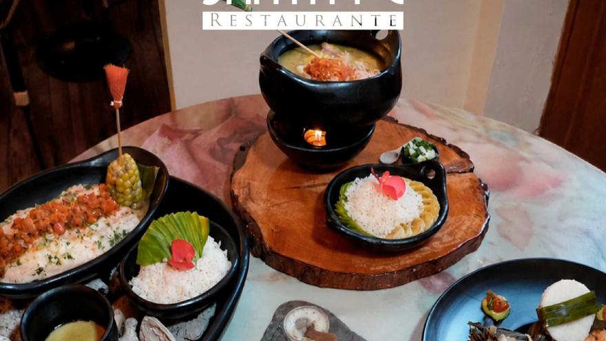 A variety of dishes from Santa Fe Restaurante, presented with colorful ingredients, side dishes, and Colombian-inspired details.