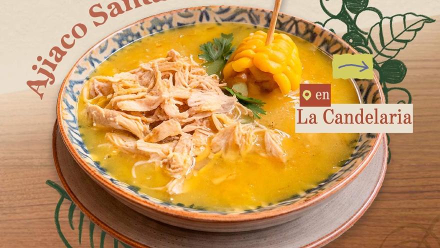 Ajiaco santafereño with chicken, potato, and corn on the cob, served in a bowl.